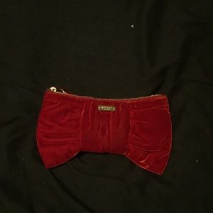 Red suede Kate spade clutch bag